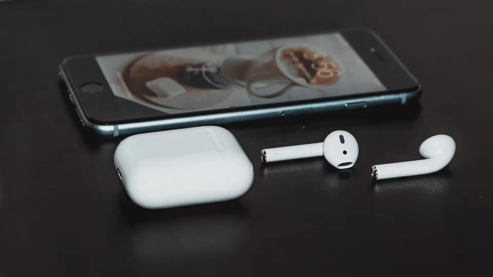 Apple iPhone & AirPods / Photo by Ben Kolde on Unsplash