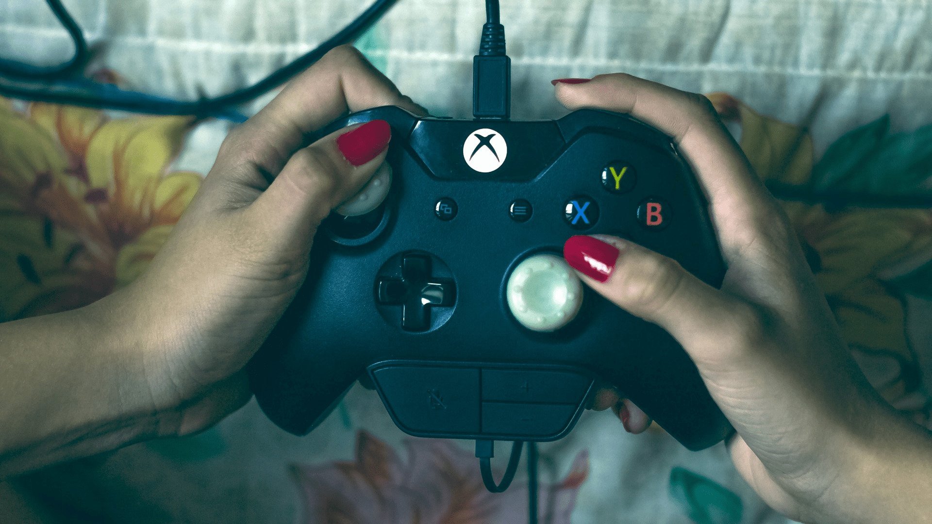 Person Holding Microsoft Xbox One Controller / Photo by Bruno Henrique from Pexels