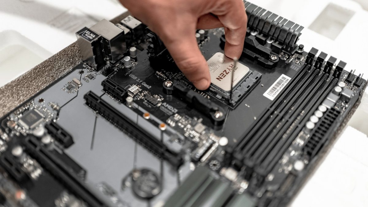 Person Installing CPU on Motherboard / Photo by IT services EU from Pexels
