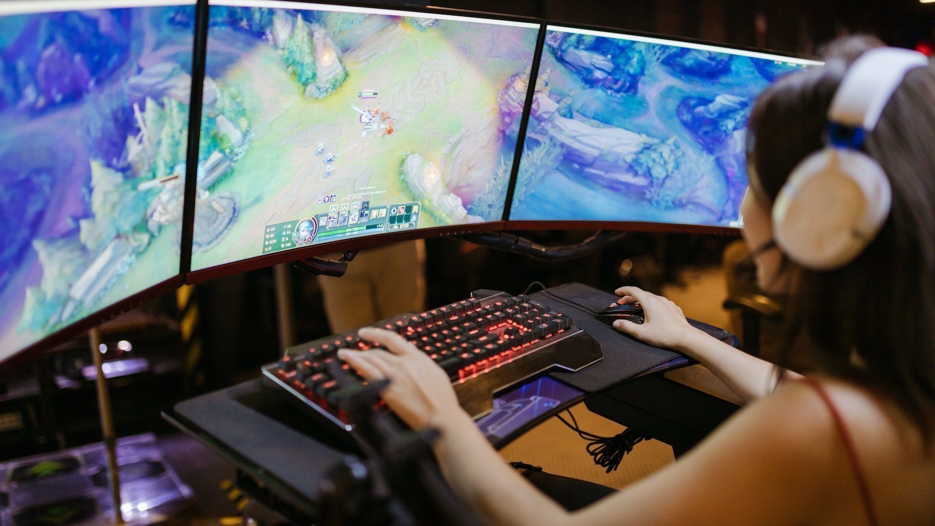 A Lady Playing League of Legends on PC