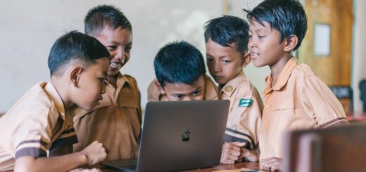 Students Looking At Macbook