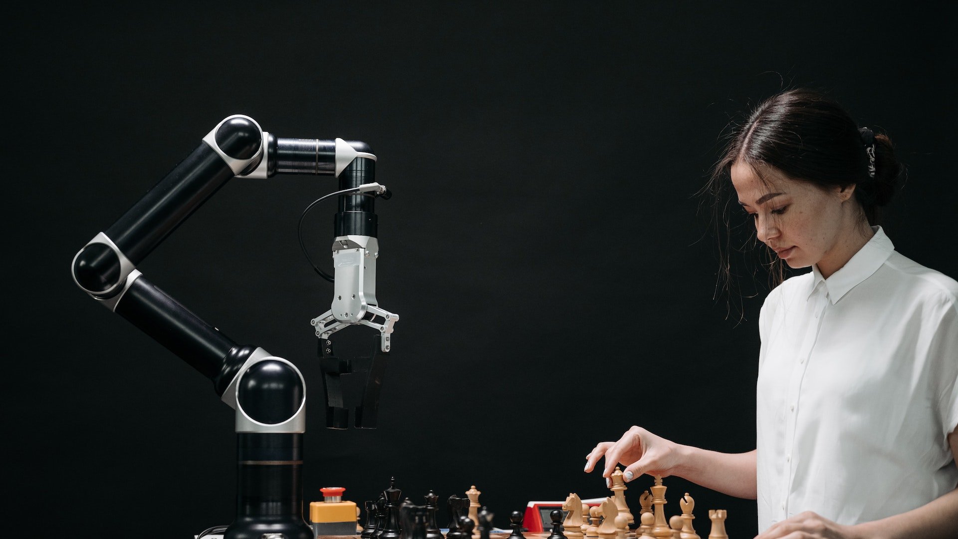 Woman Playing Chess With AI